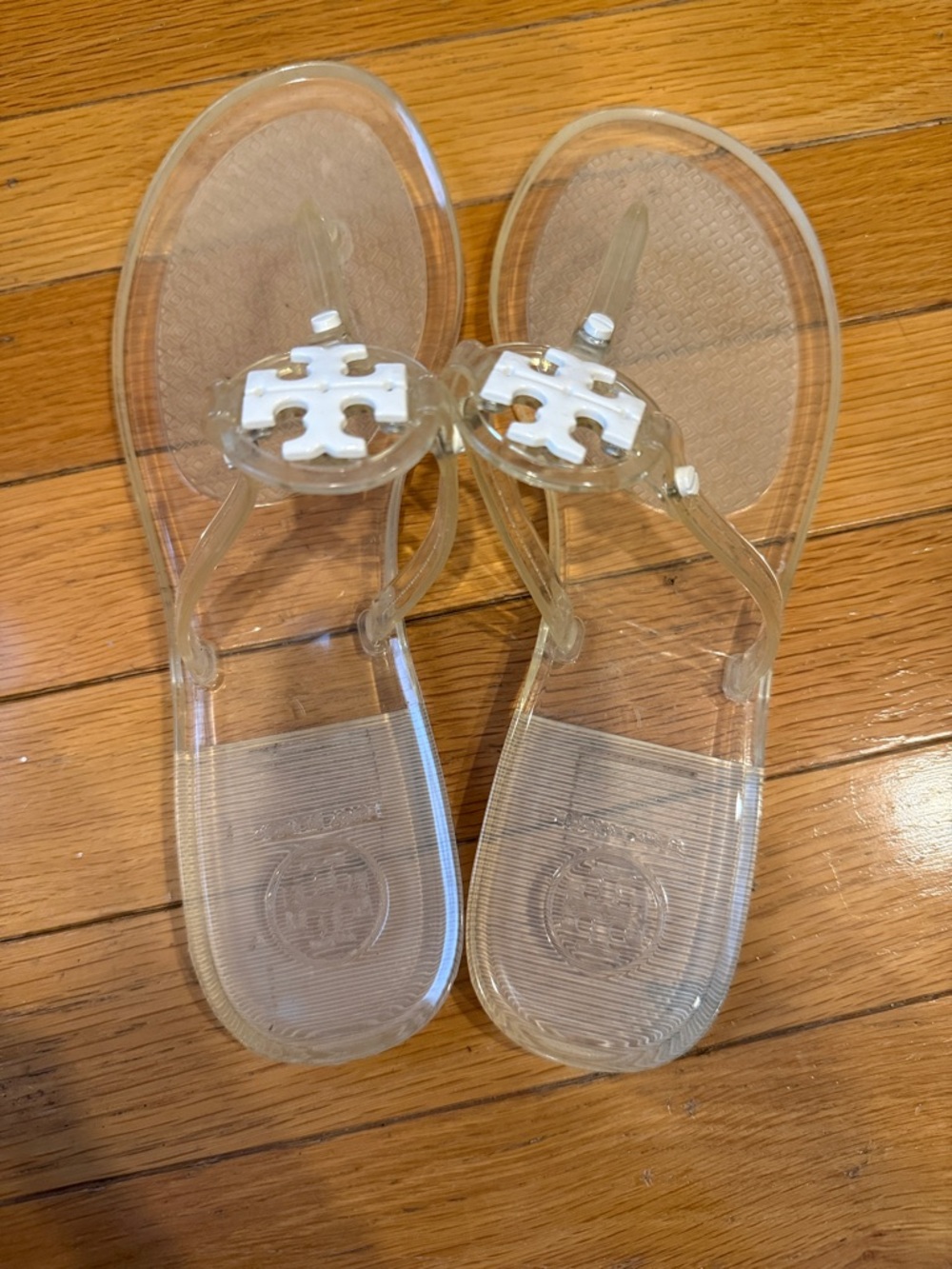 Tory Burch Clear Jelly Thong Sandals with White Logo Medallion